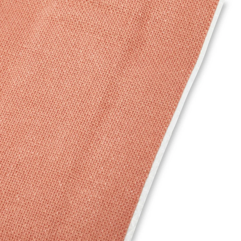 Close-up of Coverplast Dressing showing durable, elastic fabric with strong adhesion for reliable first aid protection.