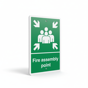 Fire Assembly Point (Poly) Sign showing group icon and arrows indicating emergency gathering location for safety.