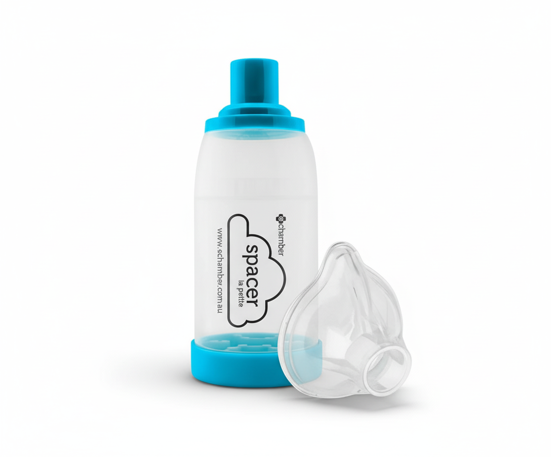 La Petite Asthma Spacer with blue components and clear mask for effective asthma medication delivery and universal MDI fitting