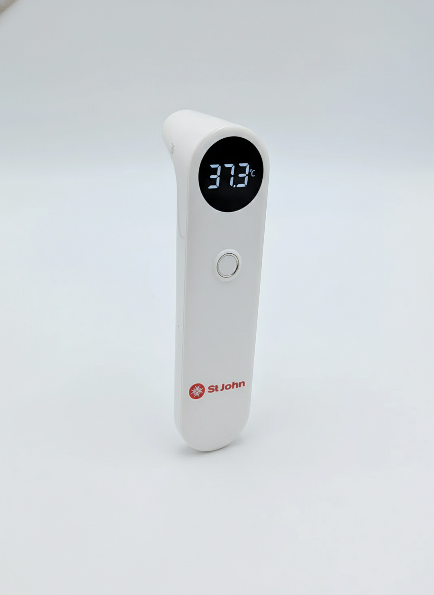 St John Infrared Thermometer showing digital temperature reading 37.3°C for fast non-contact measurement.