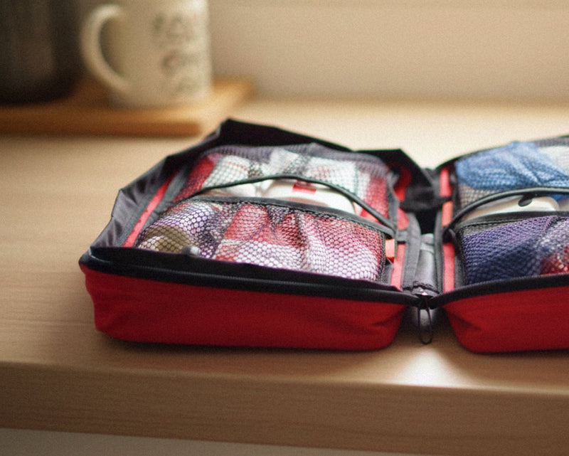 Organised mesh pockets with carry handles